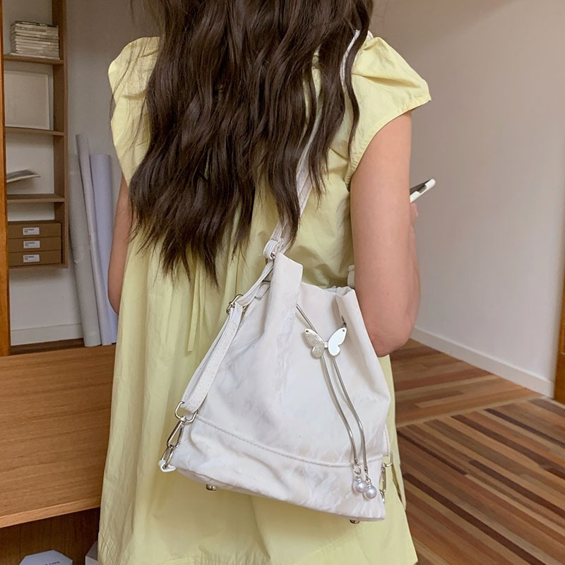 Dames Mintgroene Vlinder Trekk - Mini Backpack Women recensie en prijs